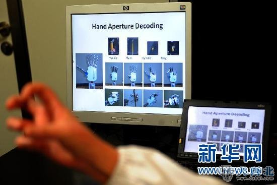 (新华直击)(6)中国科学家实现猴子大脑信号“遥控”机械手