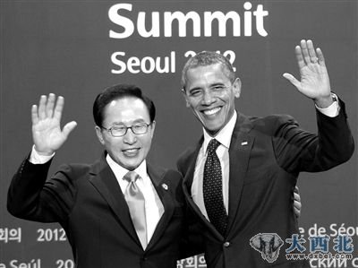27日,韩国总统李明博和美国总统奥巴马在核峰会上。 27日,韩国总统李明博和美国总统奥巴马在核峰会上。